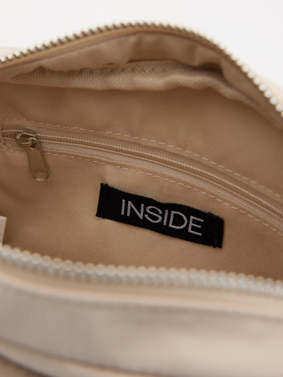 Padded nylon bag off white detail view