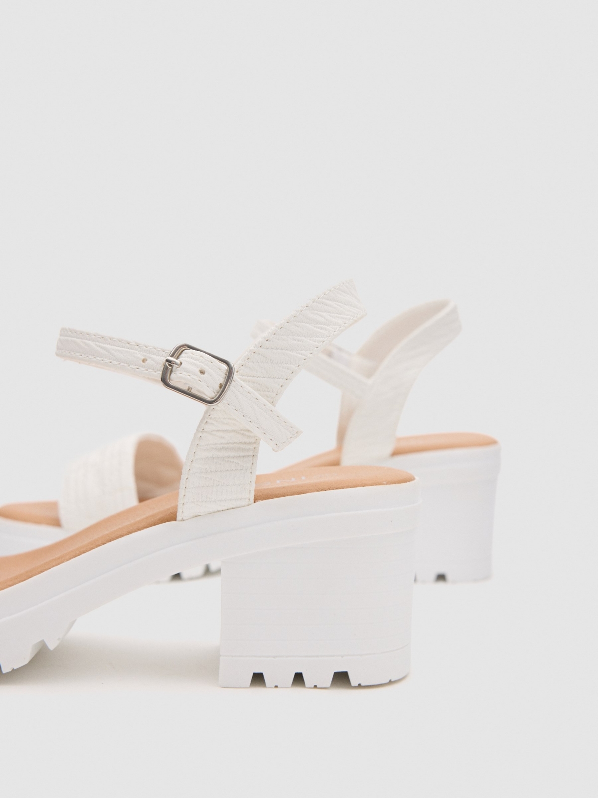 Track heel sandal white detail view