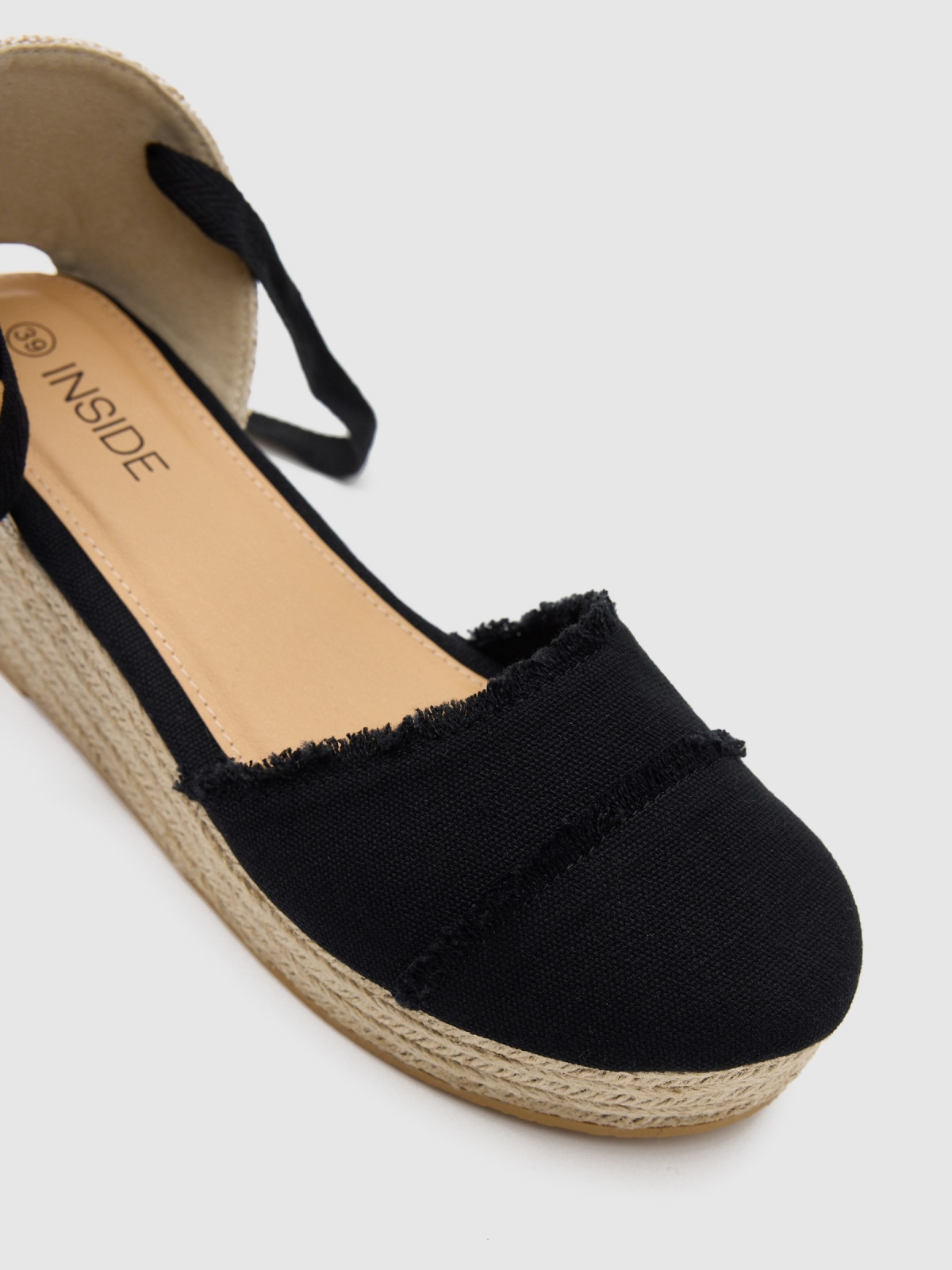 Frayed wedge black detail view