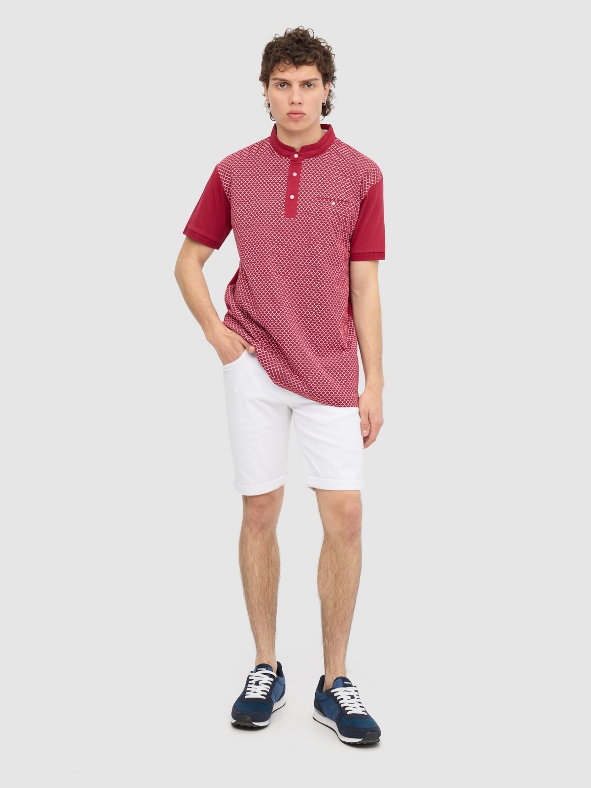 Geometric print polo garnet front view