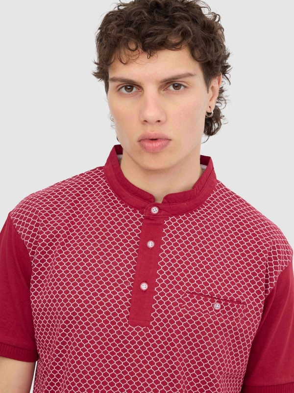 Geometric print polo garnet detail view