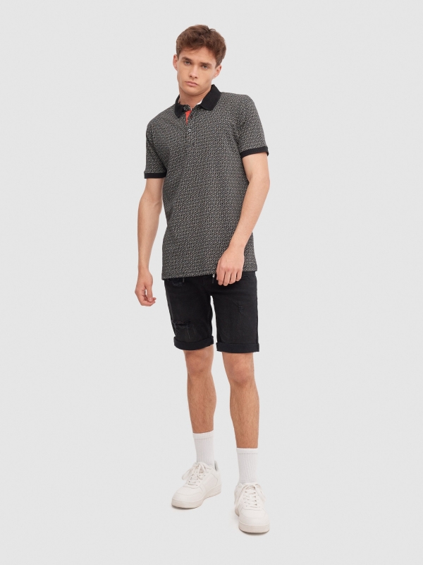 Geometric print polo black front view