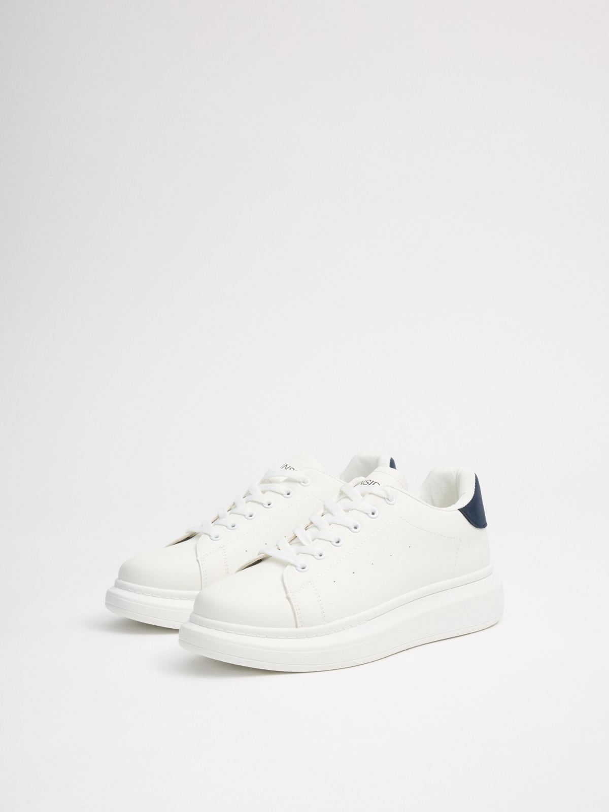 White low-top sneakers white 45º front view