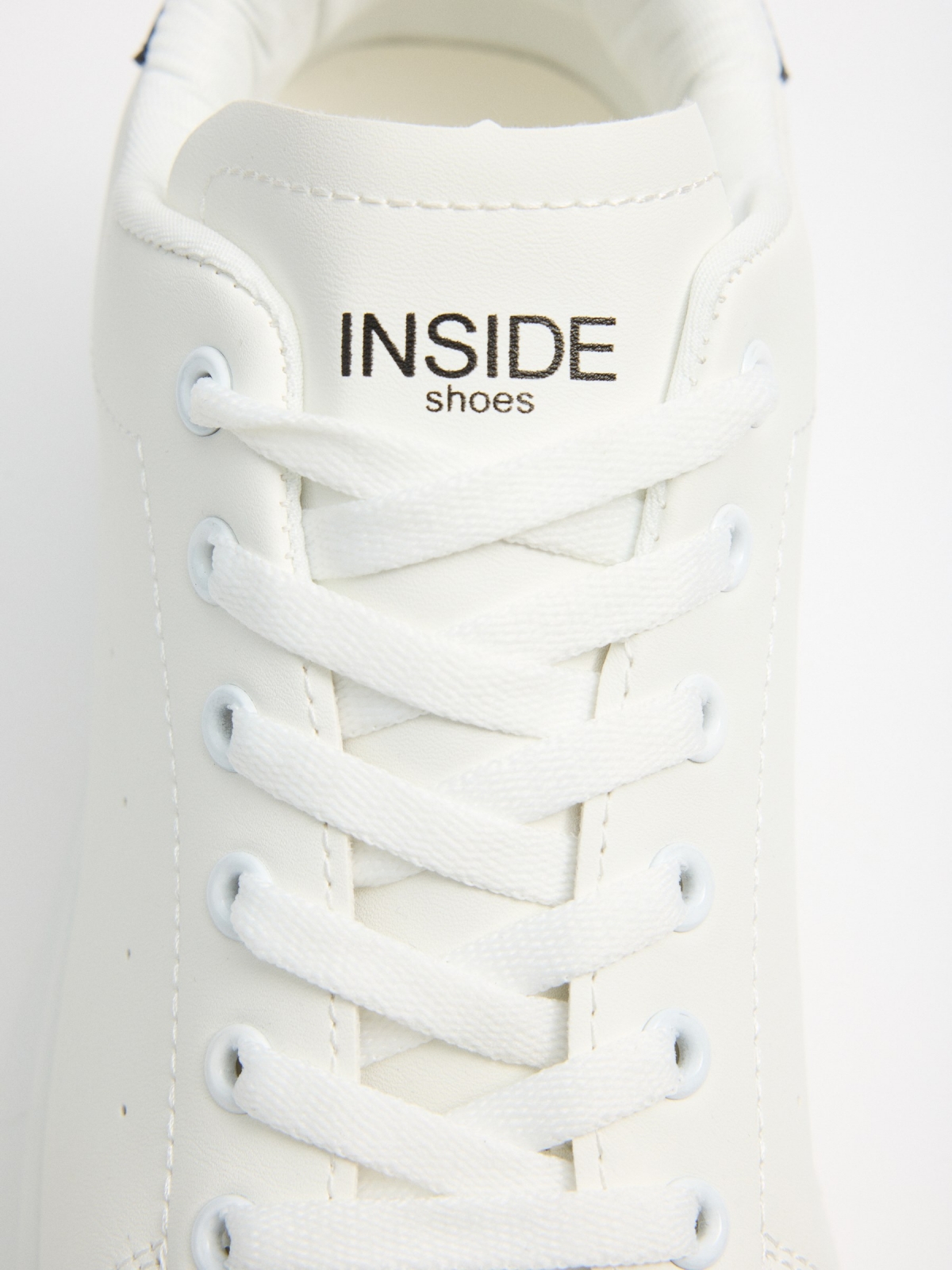 White low-top sneakers white detail view