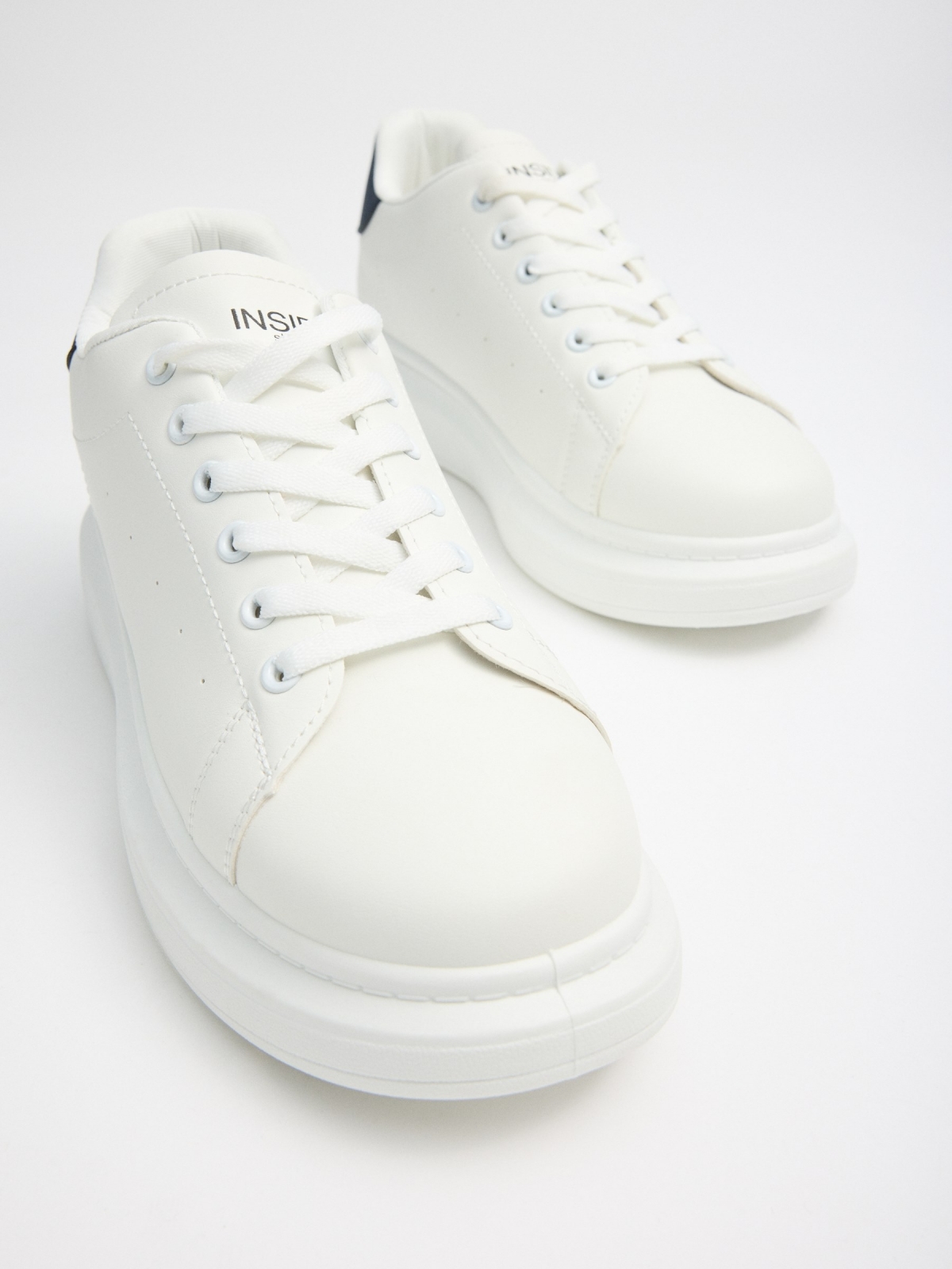 White low-top sneakers white detail view