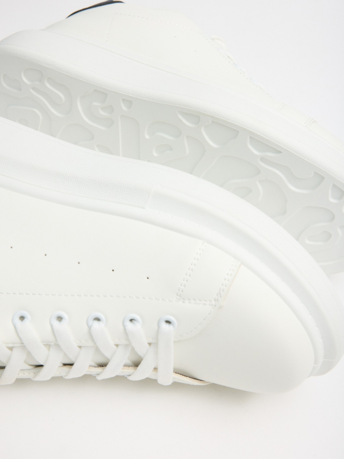 White low-top sneakers white detail view