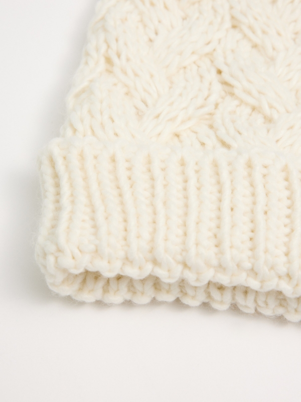 Braided pompom hat white front view