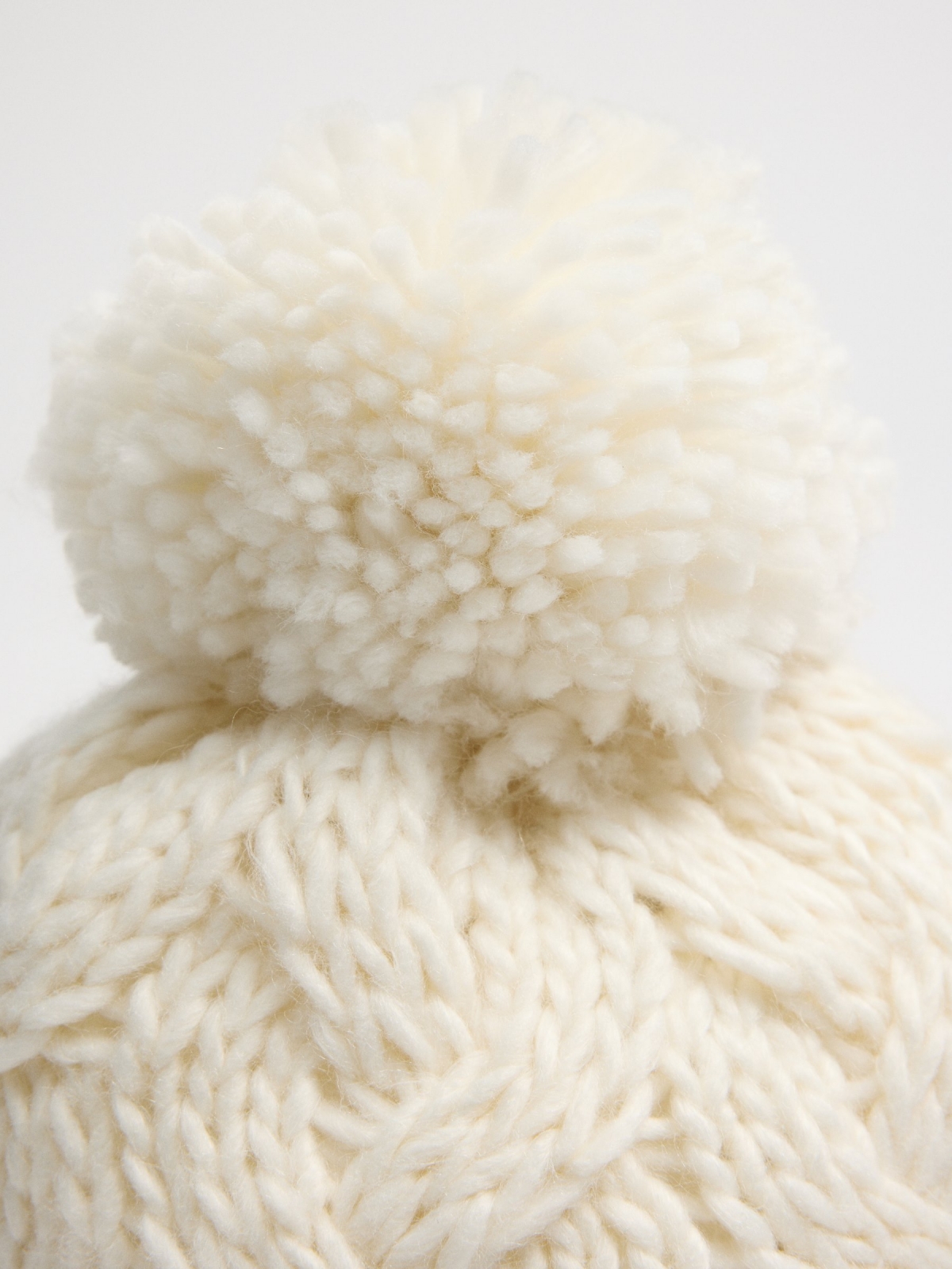 Braided pompom hat white detail view