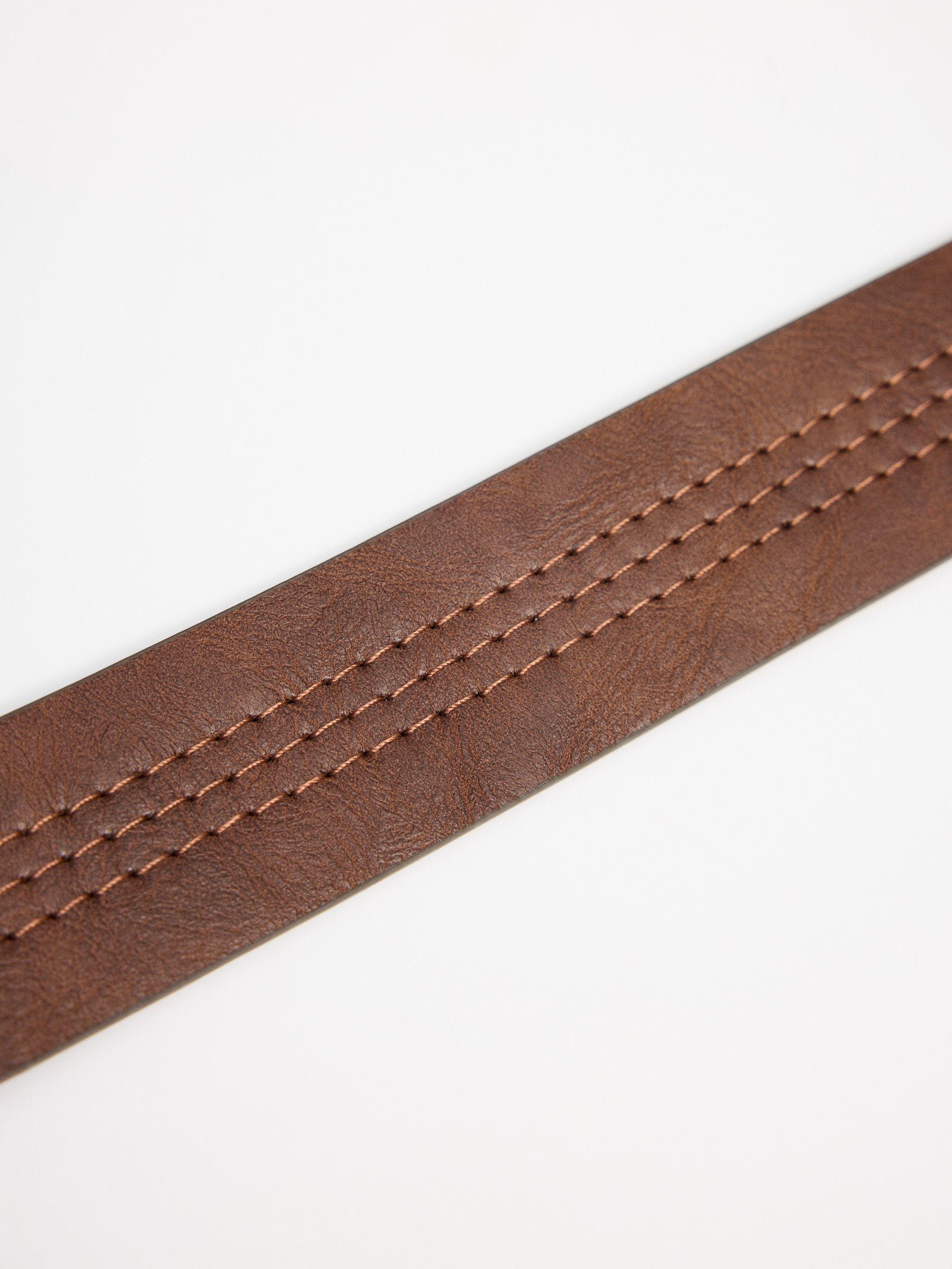 Cinturón efecto piel negro marrón enrollado