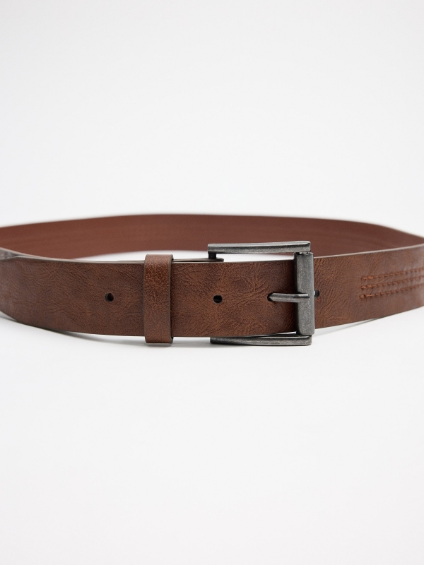 Cinturón efecto piel negro marrón vista detalle