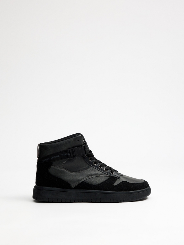 Trainer black sports boot black profile view