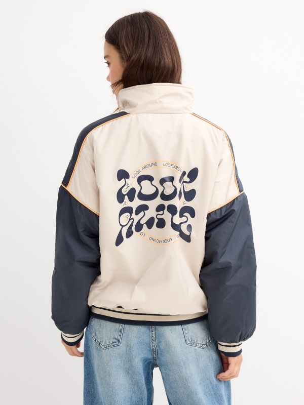 Colour block jacket and graphic navy middle back view