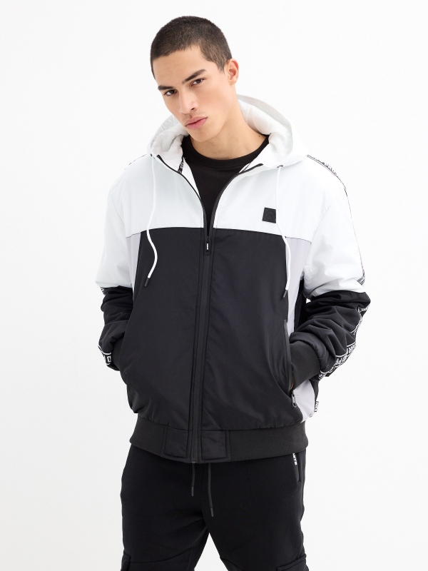 Colour block hooded windbreaker jacket black detail view