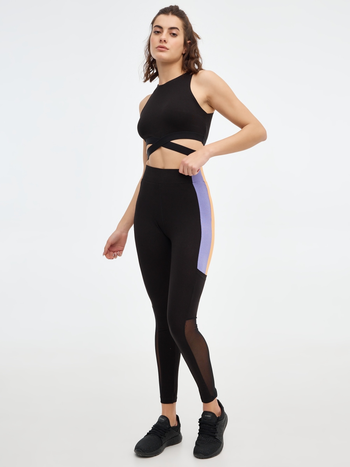 Legging color block lila negro vista media frontal