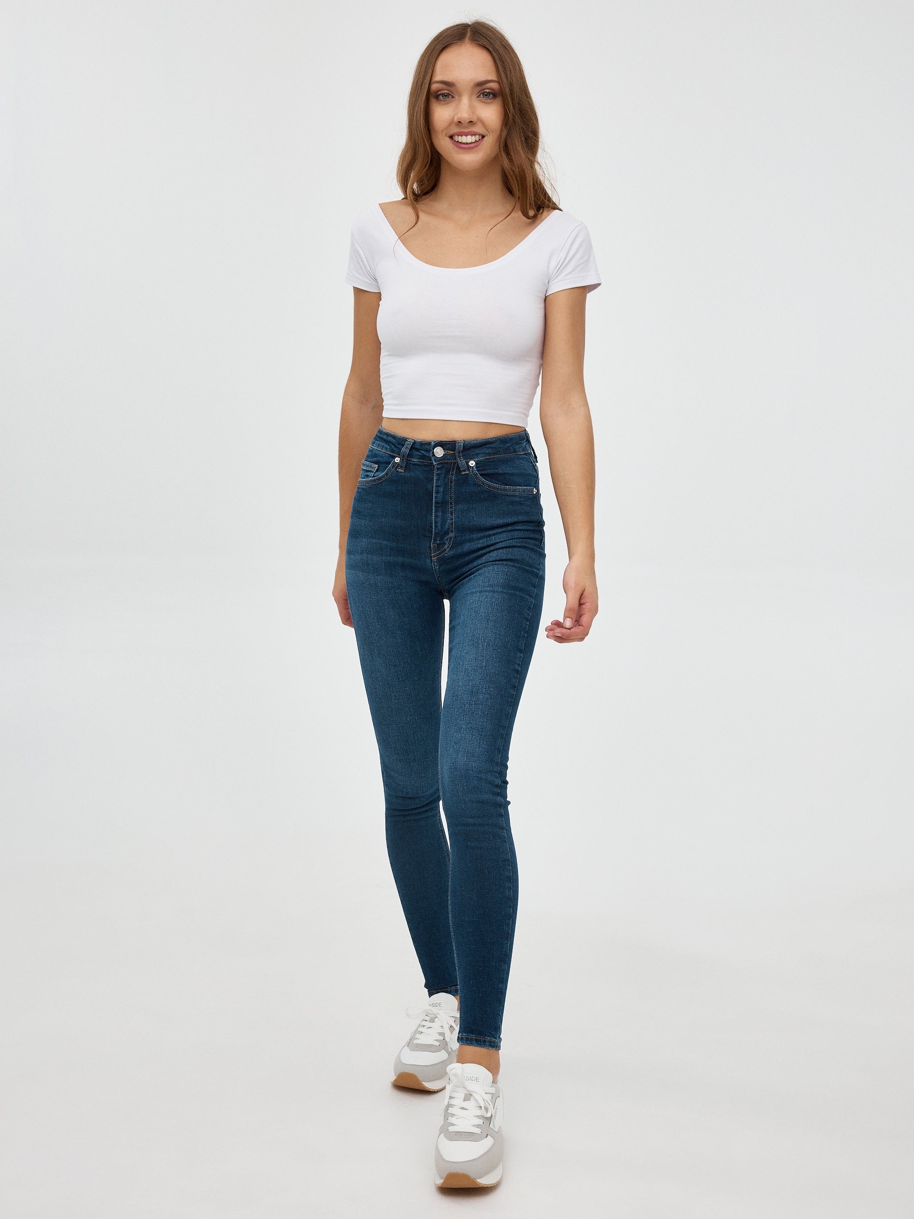 High rise skinny jeans dark blue front view