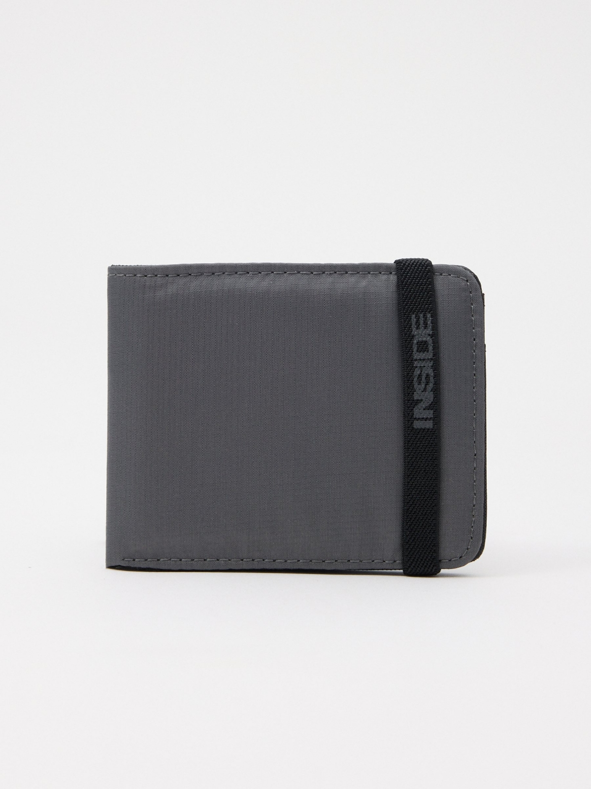 Wallet with elastic closure