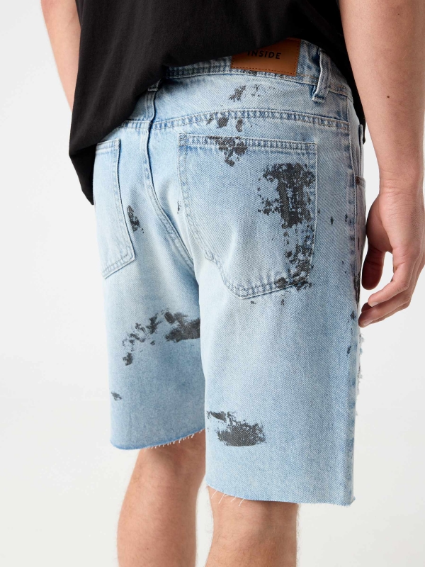 Ripped worn-effect denim bermuda shorts light blue detail view