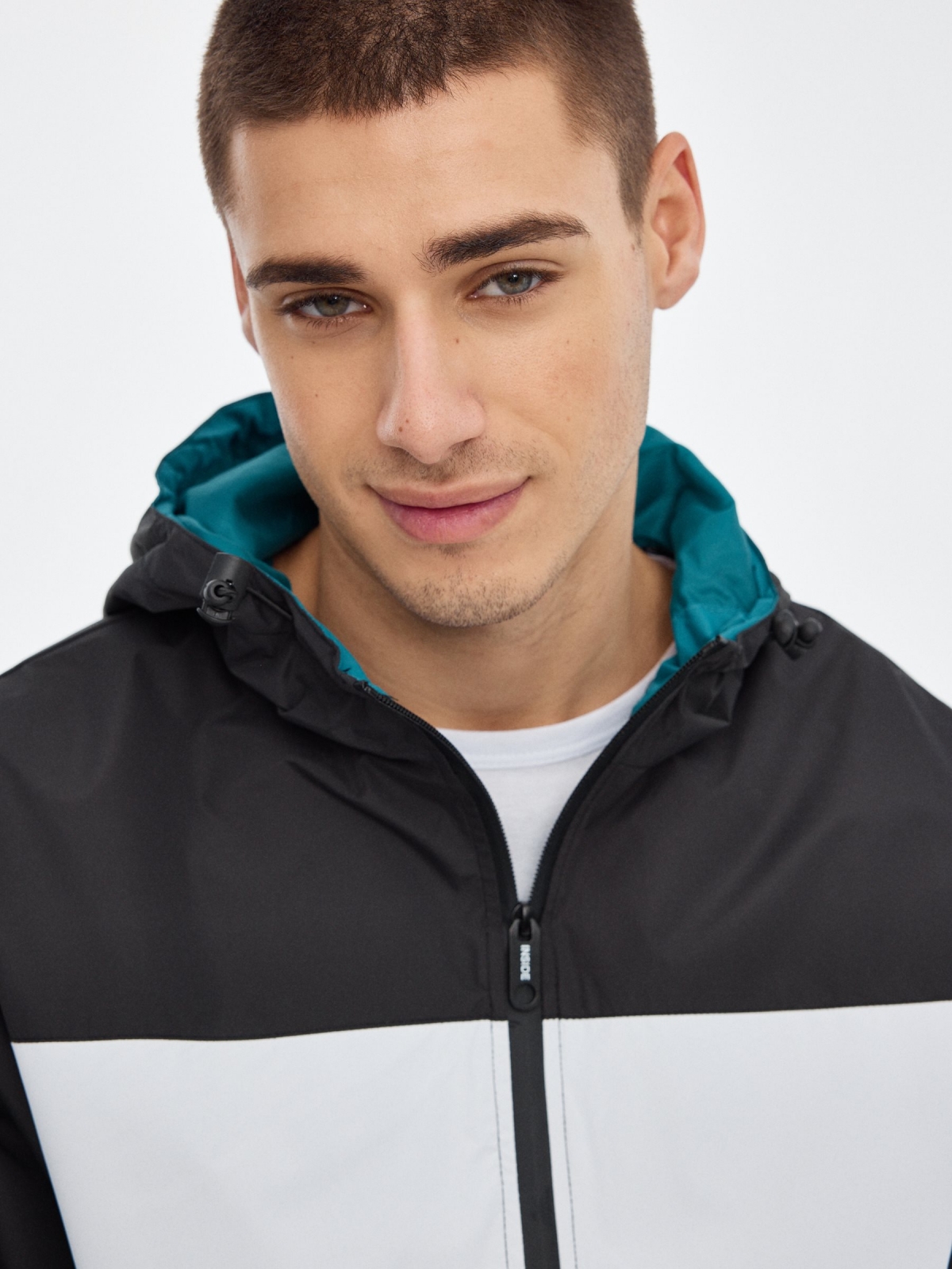 Lightweight hooded jacket black detail view