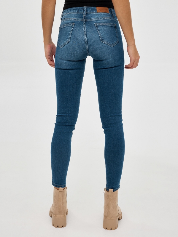 Mid rise skinny jeans blue front view