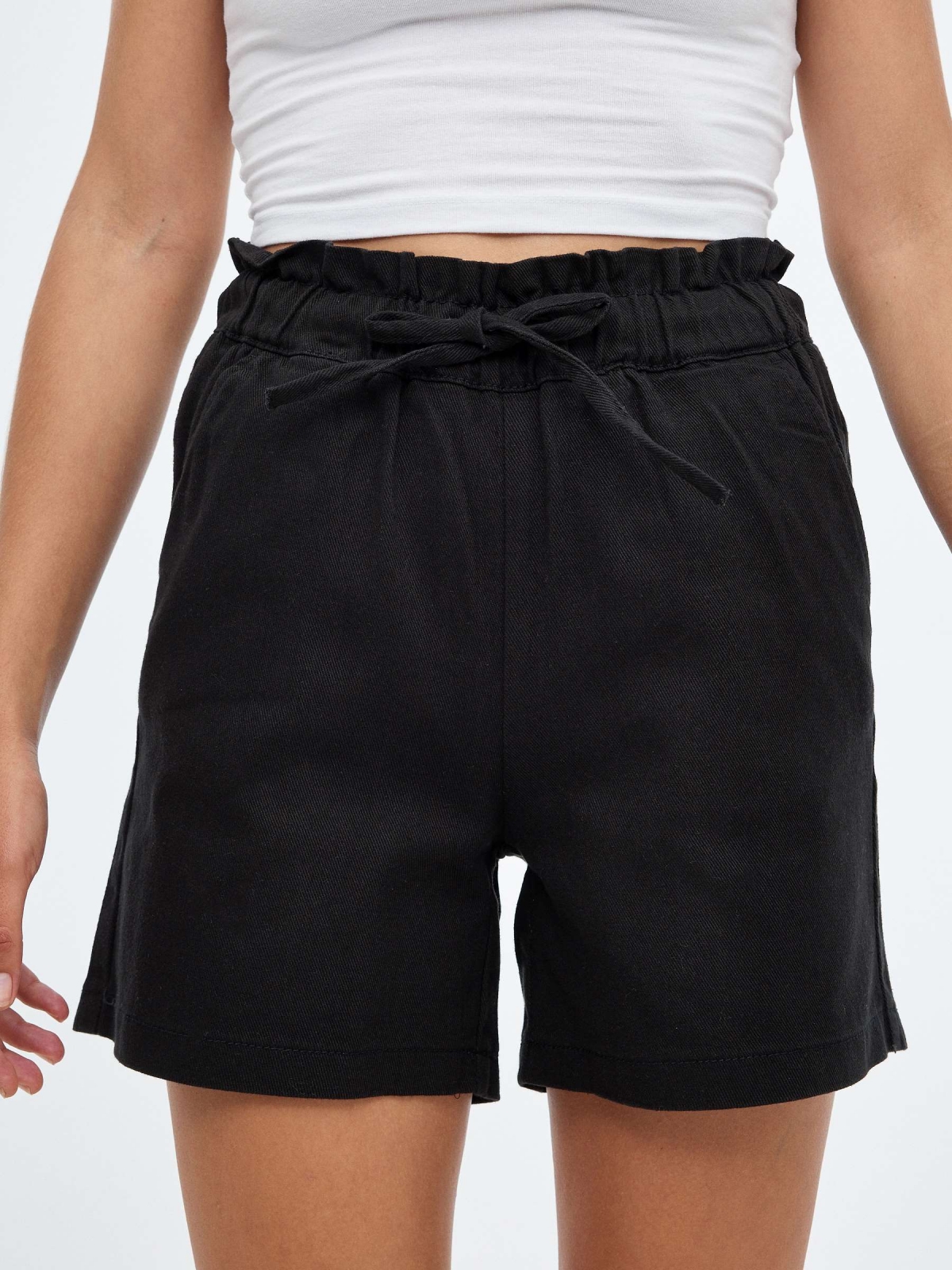 Elasticated waist shorts black detail view