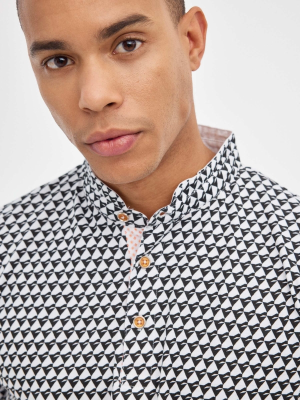 Blue geometric print polo shirt black detail view