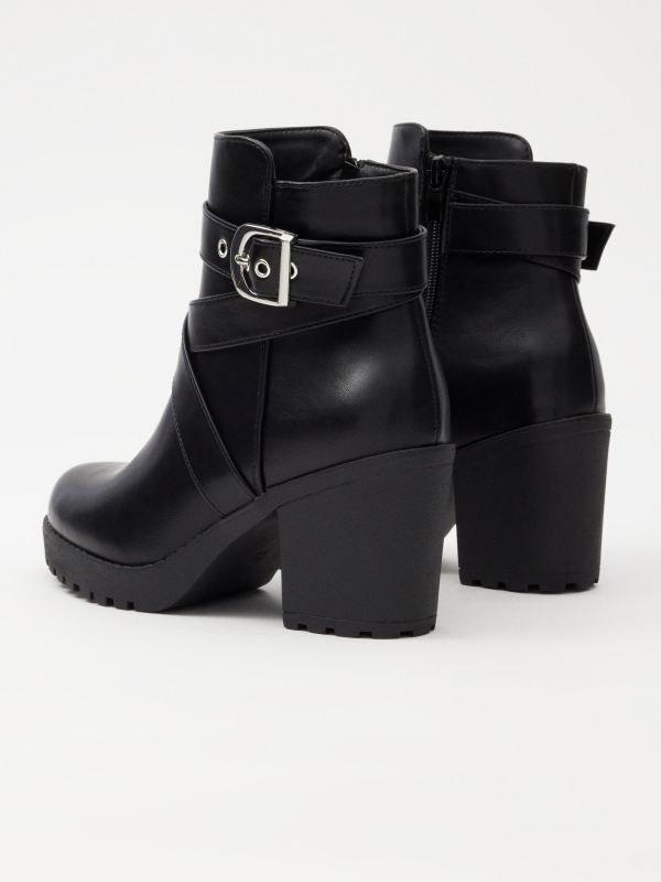 Heeled ankle boots with buckle 45º back view