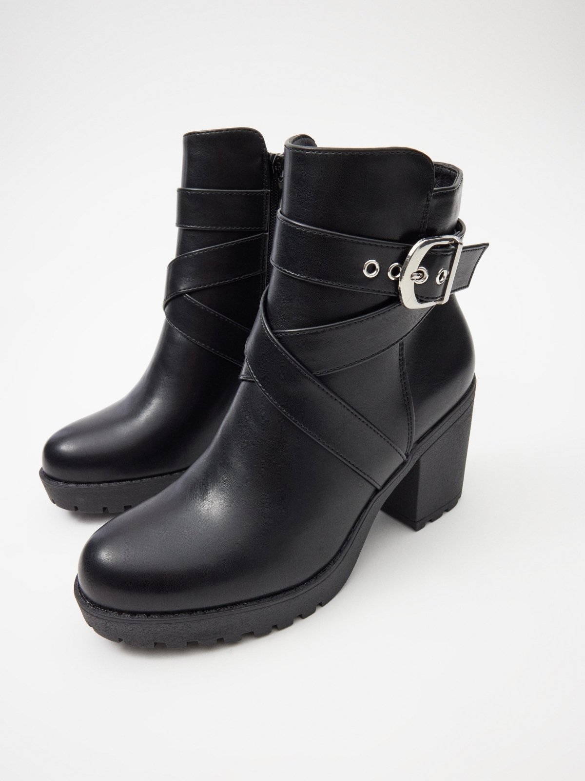 Heeled ankle boots with buckle detail view