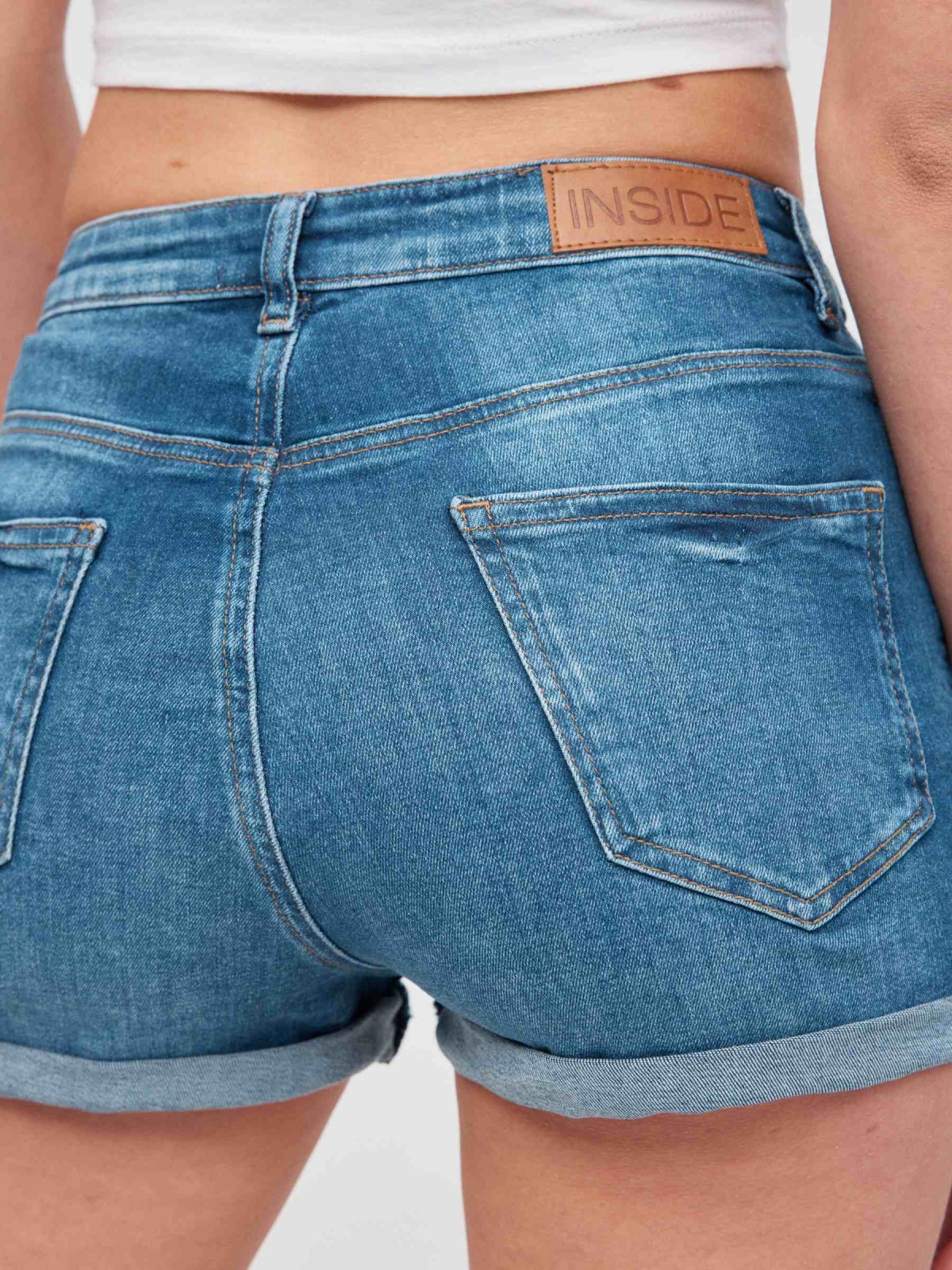 Denim high rise shorts blue detail view