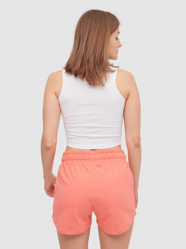 Knitted shorts with flower coral middle back view