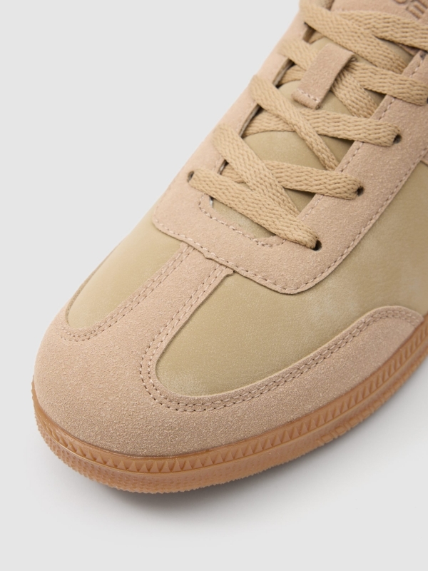 One-colour retro sneaker sand detail view