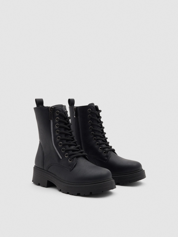 Black military boot with track sole black 45º front view