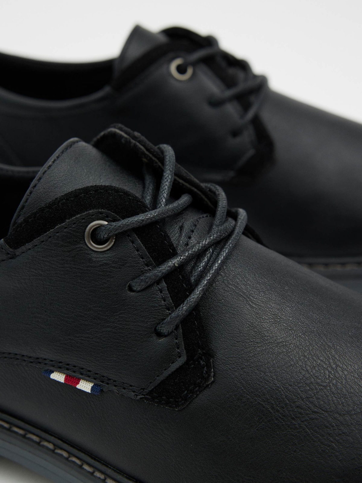 Black leather effect shoe black detail view