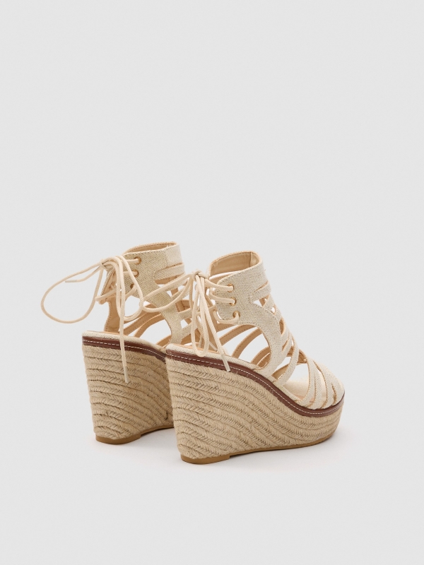 Wedge Roman straps off white 45º back view