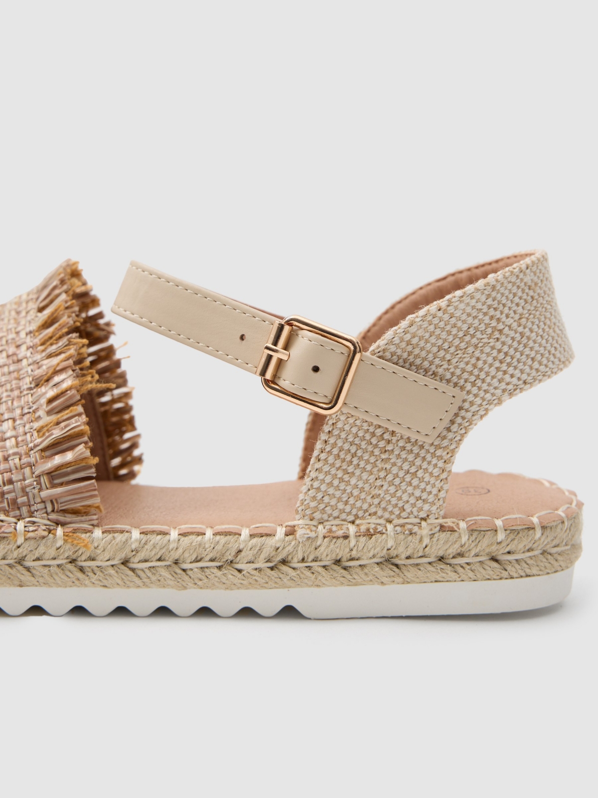 Espadrille raffia sandal sand detail view