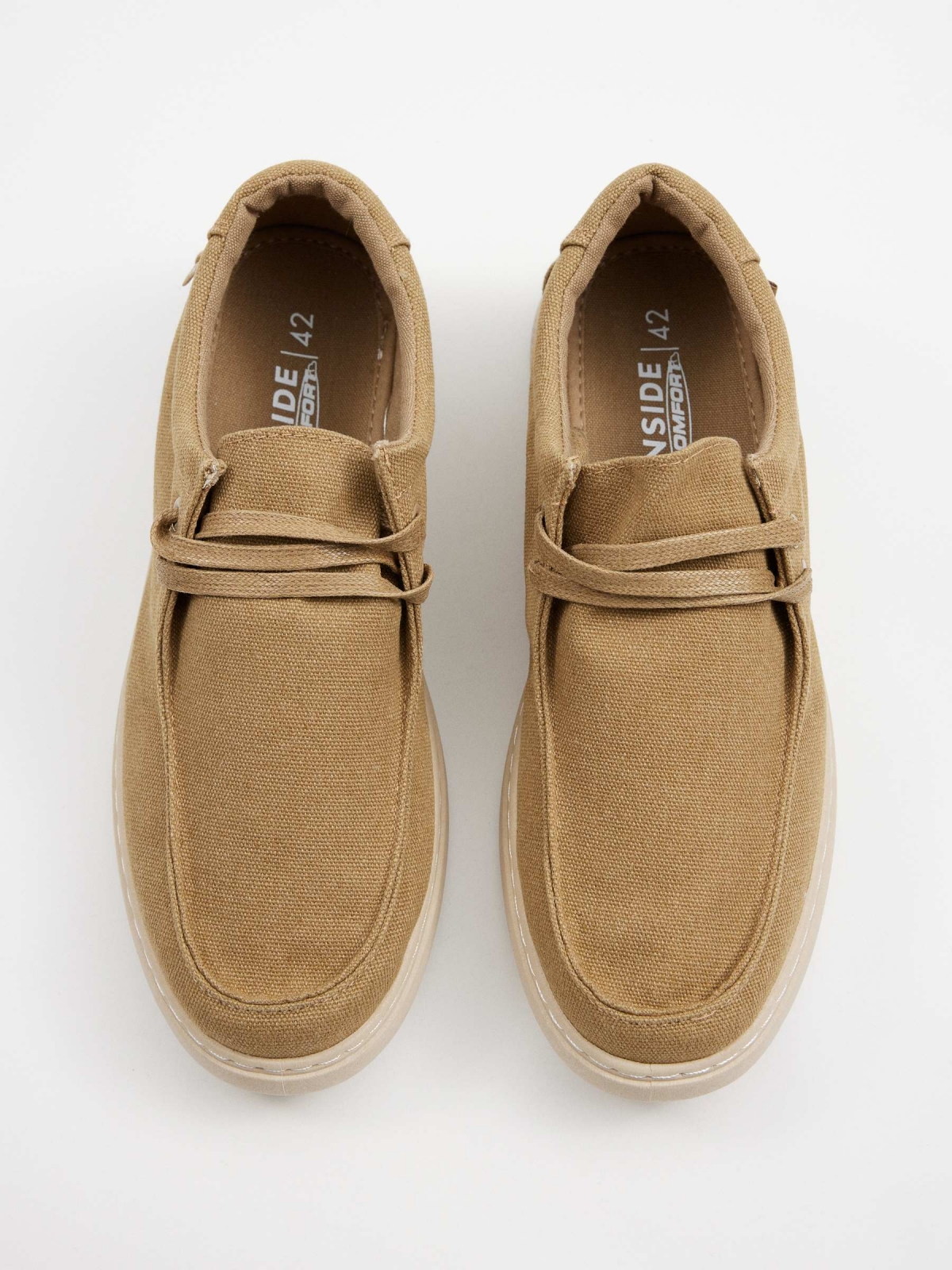 Canvas wallabee shoe sand zenithal view