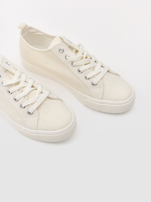 Shiny canvas sneaker off white detail view