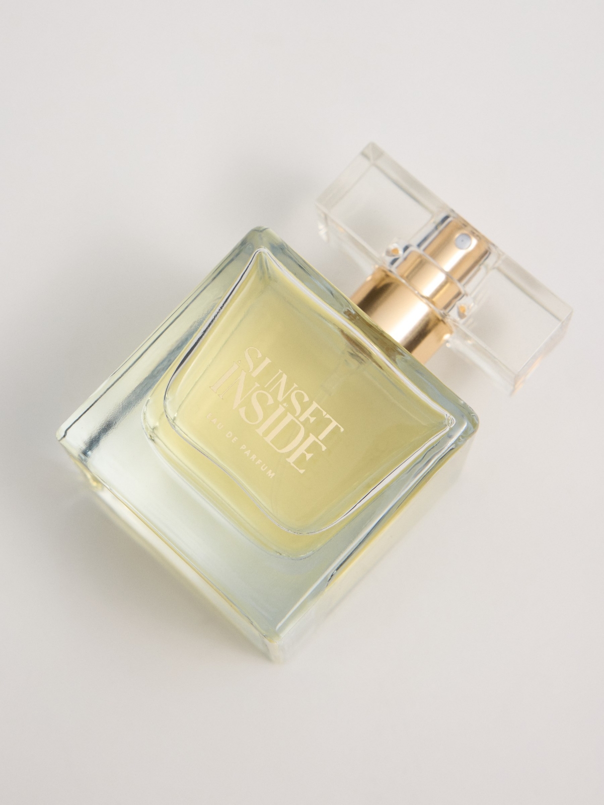 Inside Sunset Perfume transparent detail view