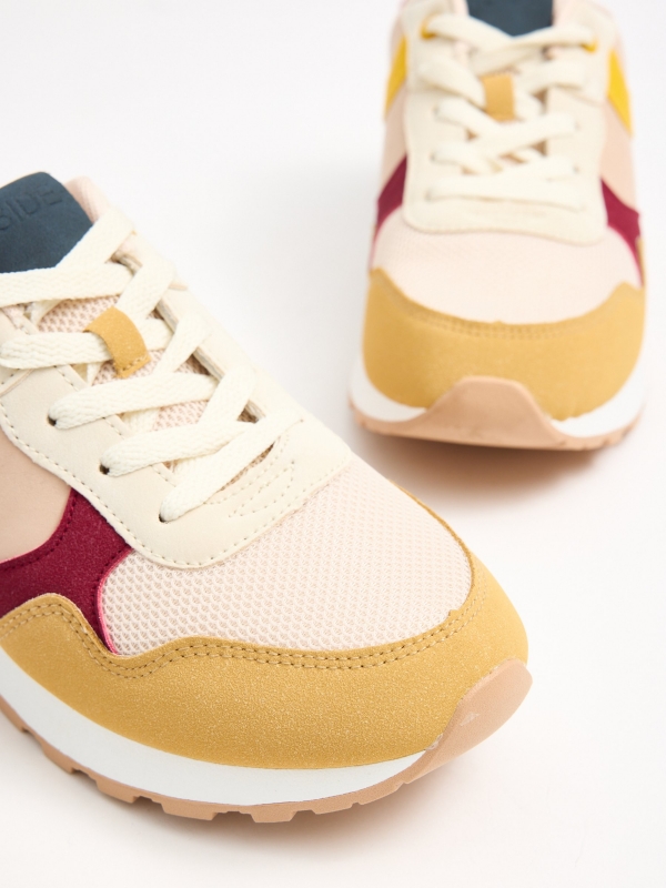 Multi-piece combination sports shoe pastel yellow detail view