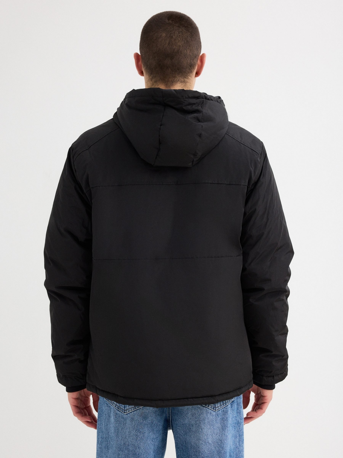 Hooded black parka black middle back view