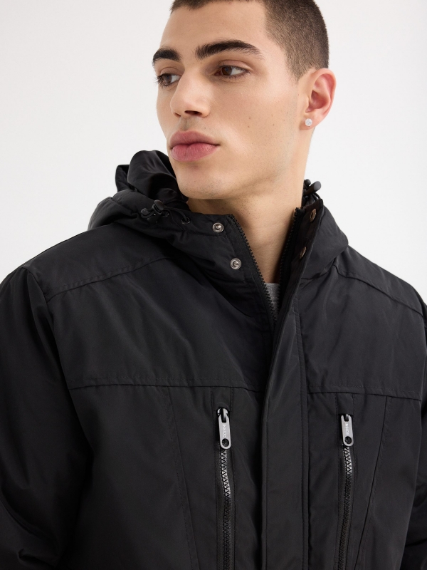 Hooded black parka black detail view