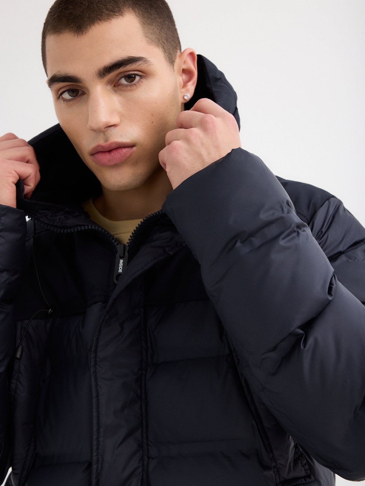 Hooded parka blue detail view