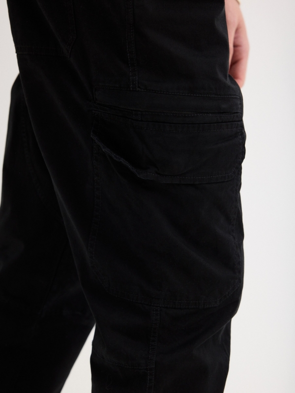 Black sport jogger trousers grey detail view