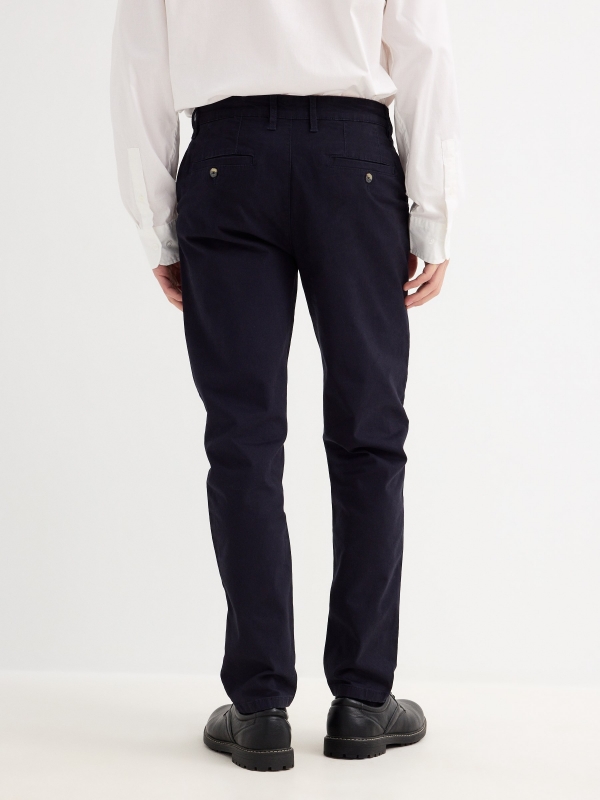 Chino gabardine trousers blue middle back view