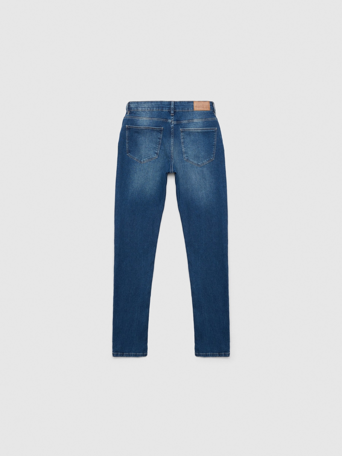 Jeans slim tiro medio denim azul vista trasera