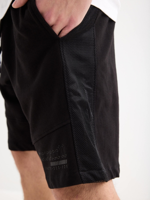 Calções de jogger desportivo preto vista detalhe frontal