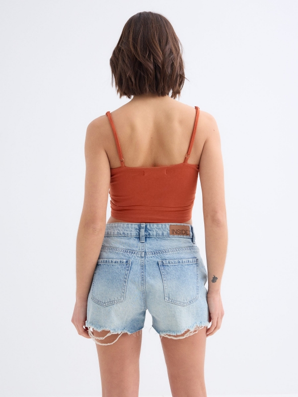 Low Rise denim shorts light blue middle back view