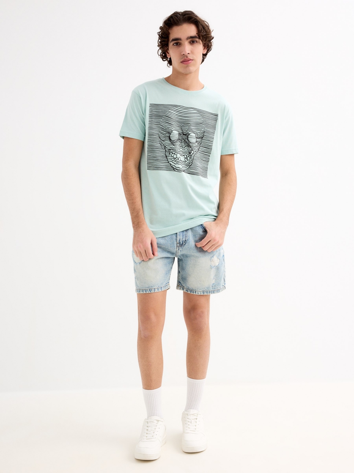 Denim Bermuda shorts with rips blue general front view