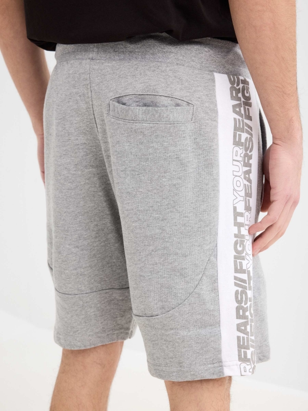 Bermuda jogger shorts with text grey back detail view