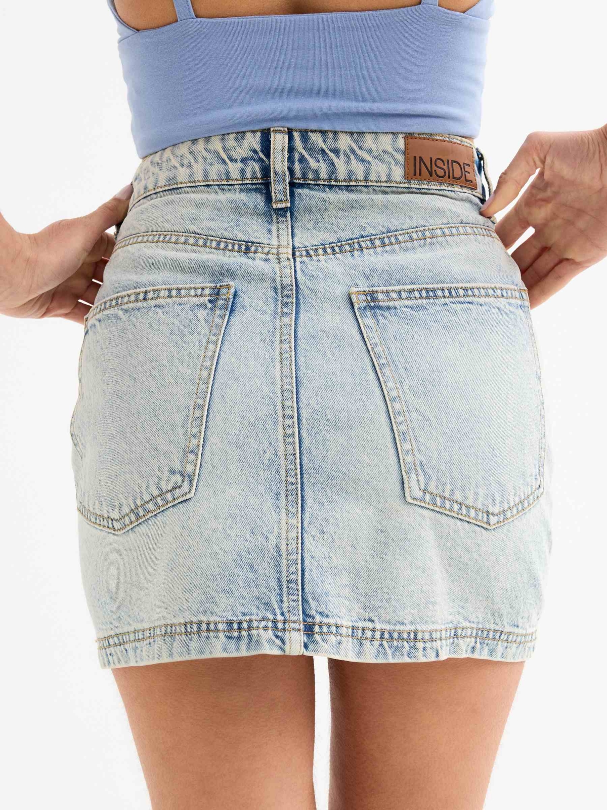 Ripped denim mini skirt blue back detail view