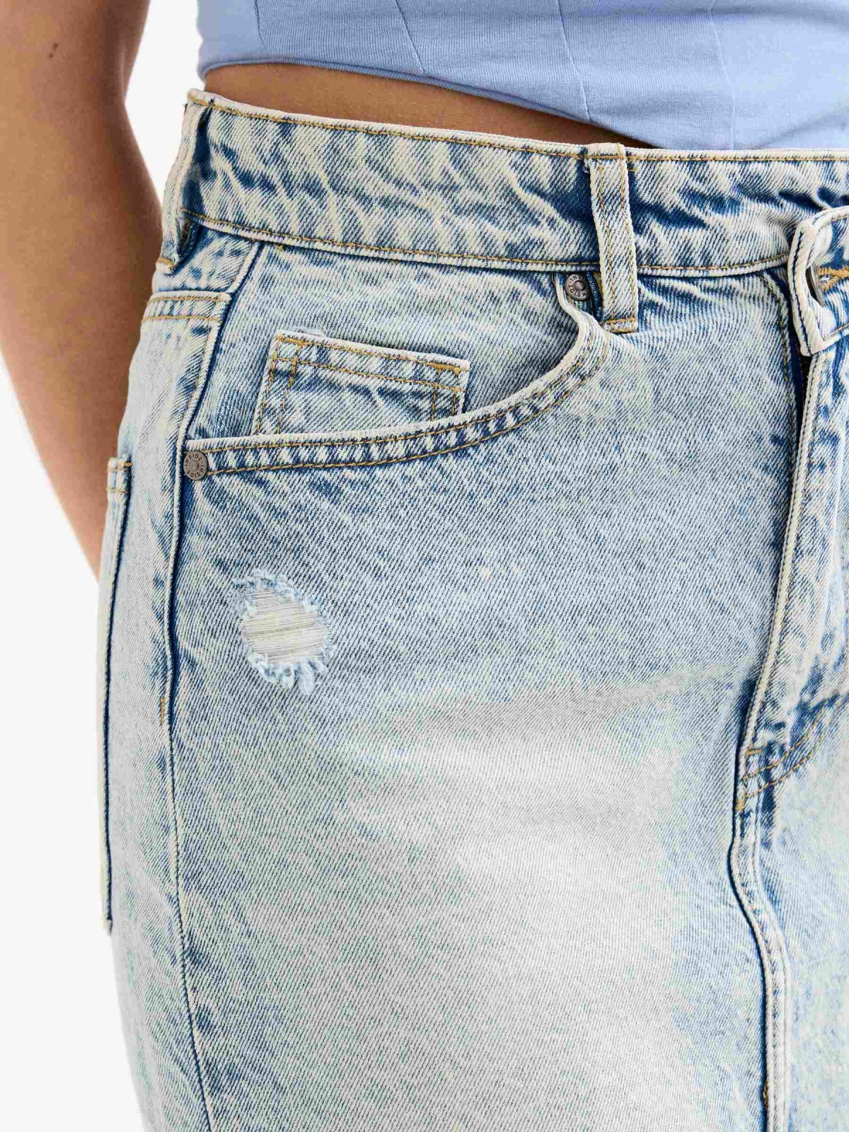 Ripped denim mini skirt blue detail view